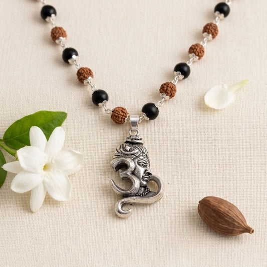 Silver Cap Rudraksha Karungali Mala with Shiva Om Pendant